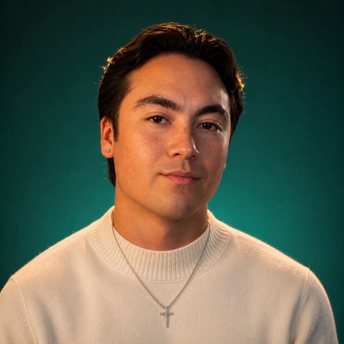 Ty Farrago against an emerald green background